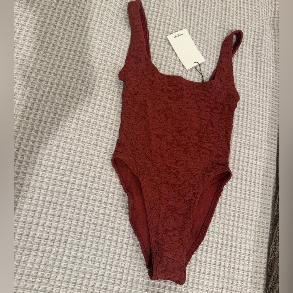Bond-eye one size Madison one piece. NWT.